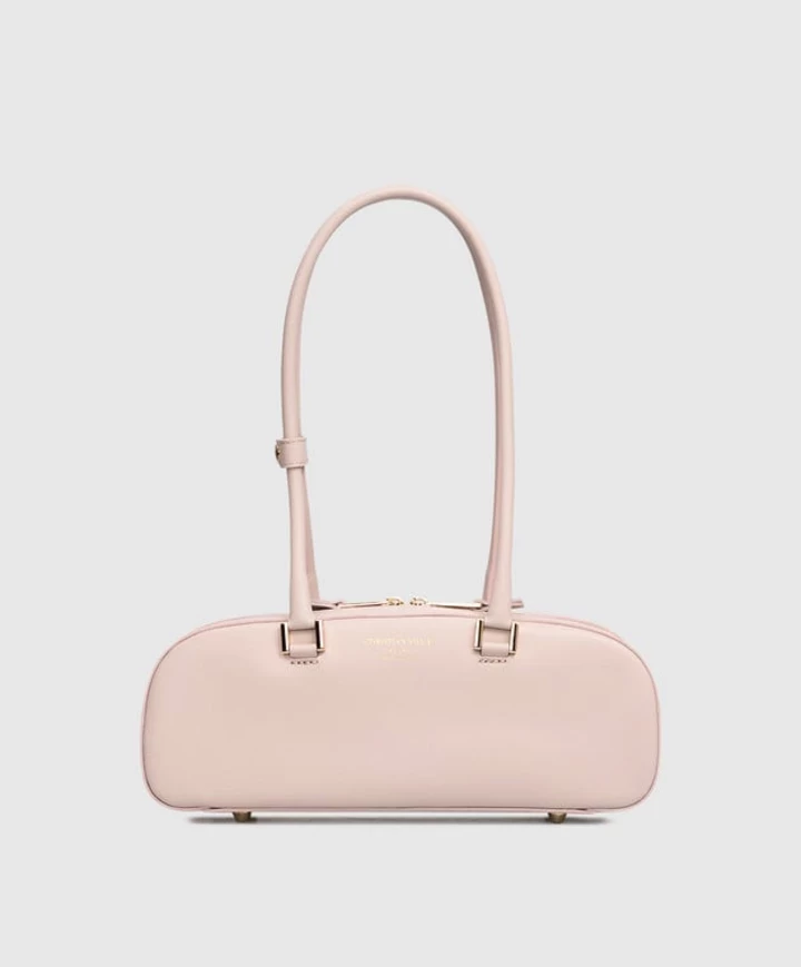 Ця витончена сумочка - ідеальний відтінок для цього літа.
11